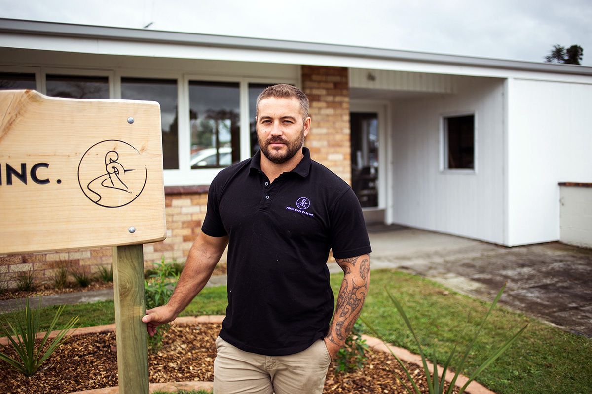 Shannon Te Huia standing in front of the Puniu River Care offices