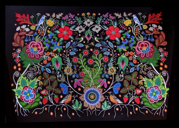 An intricate, colourful, beadwork-inspired painting of nature on a black background